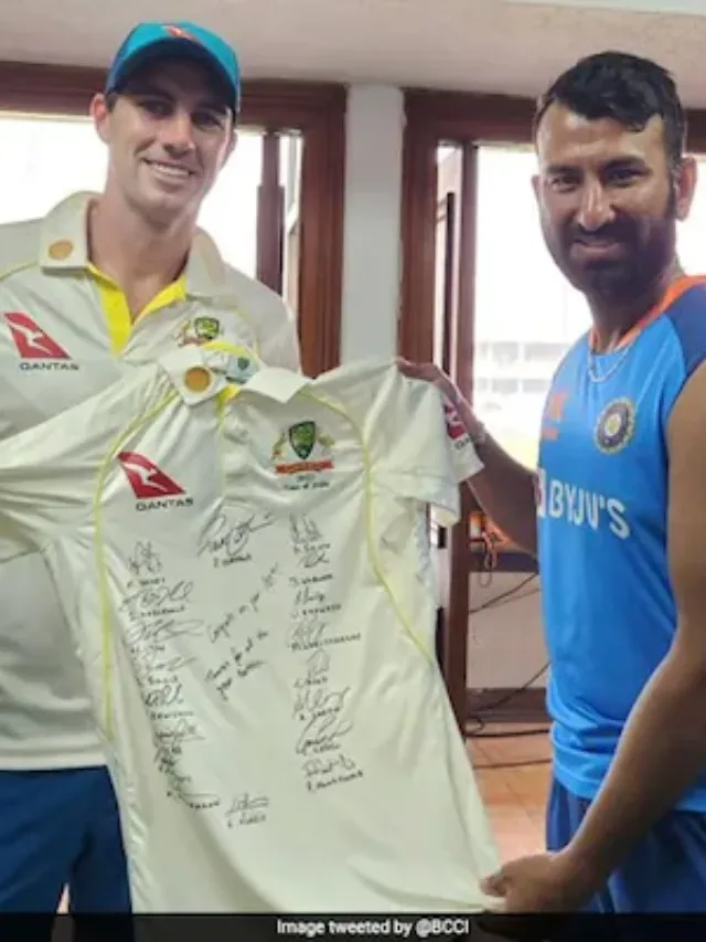 Chetehwar Pujara receives  autographed team Jersey from Australia’s Captain Pat Cummins